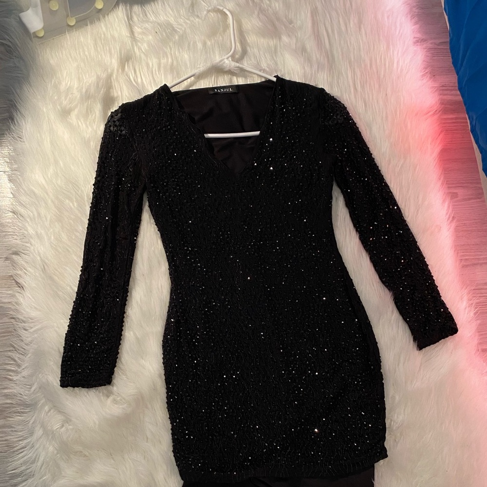 Skin tight, black diamond mini dress